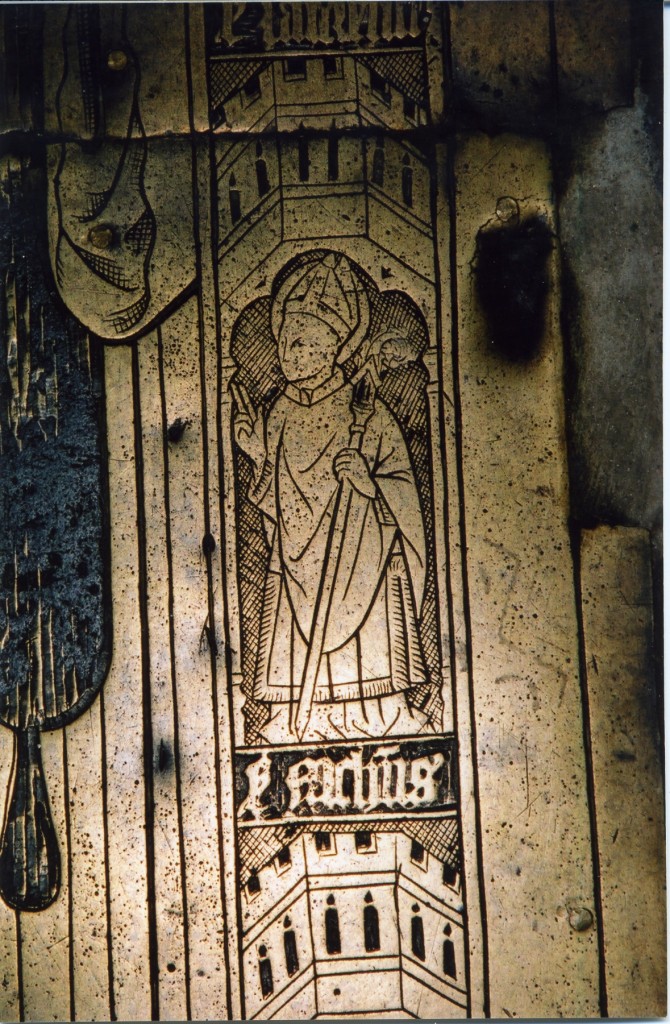 Photograph of detail of the brass showingSt Nicholas